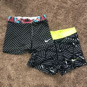 2 pairs of patterned Nike spandex